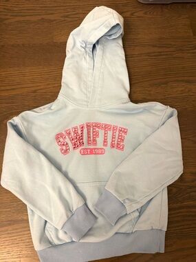 Lola + The Boys Light Blue Hoodie with Pink SWIFTIE Logo